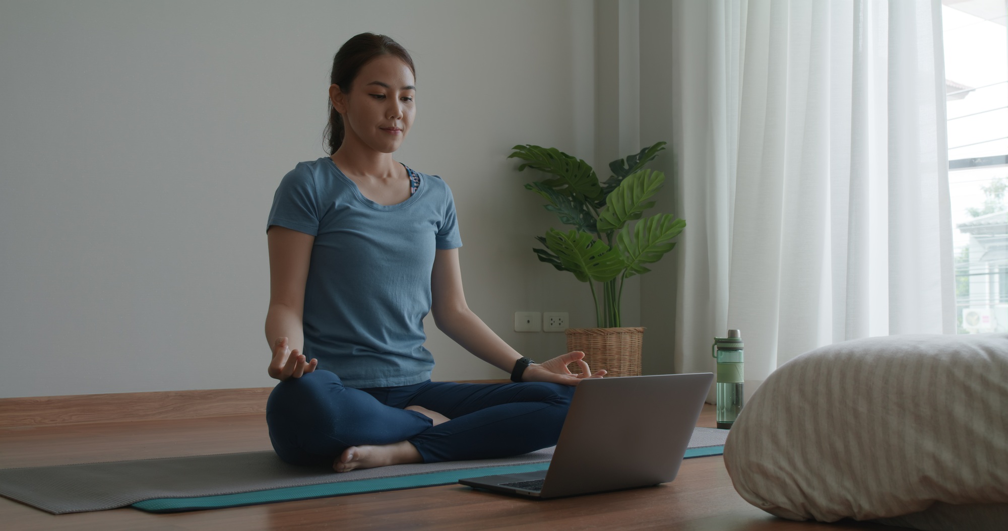 Asia people sport woman enjoy study happy watch live video sit on yoga mat