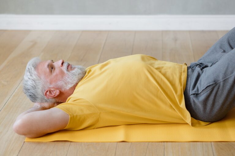 senior yoga shavasana or meditation for health promotion. do sports fitness or yoga at home